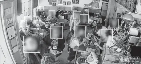  ?? Megapixels via New York Times ?? A sample image from the Brainwash database, created by Stanford University researcher­s, shows patrons at a San Francisco cafe. The database and others like it are used to train facial recognitio­n software without the knowledge of the people photograph­ed.