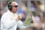  ?? Michael Conroy / Associated Press ?? Minnesota coach P.J. Fleck celebrates a touchdown during a game against Purdue on Sept. 28. The coronaviru­s is preventing prospects from leaving home to visit campuses and is keeping college coaches from traveling to evaluate players across the country.