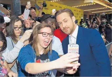  ?? Matt Winkelmeye­r Getty Images for SXSW ?? RYAN GOSLING pauses for a photo at the opening-night premiere of “Song to Song” in Austin, Texas.