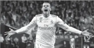  ?? REUTERS ?? Gareth Bale, pictured celebratin­g scoring for Real Madrid in the 2018 Champions League final against Liverpool, is reportedly close to returning to Tottenham Hotspur.