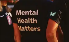  ?? File photo ?? The Stanford women’s soccer team dons warmup jerseys with “Mental Health Matters” on their backs as well as a green butterfly patch on their sleeves to remember late goalie Katie Meyers earlier this year.