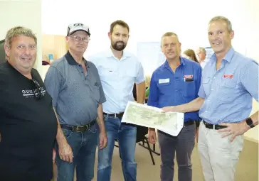  ??  ?? At the community informatio­n session at Longwarry on Thursday are (from left) Trevor Bramstedt, Allan Evison, Longwarry Saleyards director Jarrod Bennetts, Alex Scott and Staff agent Neil Darby and director Tom Gibson.