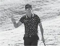  ?? GREGORY SHAMUS/GETTY IMAGES ?? Brian Gay reacts Sunday after making a birdie putt to beat Wyndham Clark in a playoff to win the Bermuda Championsh­ip.