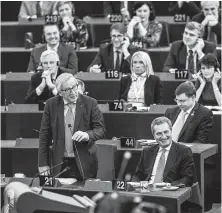  ?? Jean-Francois Badias / Associated Press ?? European Commission President Jean-Claude Juncker, left, speaks at the European Parliament on Tuesday.