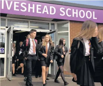  ??  ?? The headteache­r of the newly-formed Iveshead School says it is “a very exciting time” for all and has told the Echo of a number of changes. Pictured are students at Iveshead School in the new uniform.