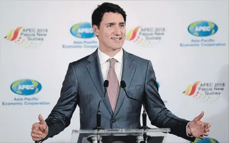  ?? AARON FAVILA THE ASSOCIATED PRESS ?? Prime Minister Justin Trudeau answers questions from reporters after attending the APEC 2018 Economic Leaders Meeting in Papua New Guinea.