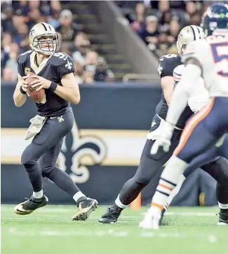  ?? AP ?? Drew Brees, izquierda, es la principal figura de los New Orleans Saints.