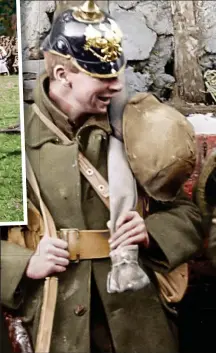  ??  ?? Grin when you’re winning: A Lewis gunner (right) with two mates in captured German helmets after the Battle of the Ancre in 1916