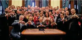  ?? Courtesy ?? Texas Republican­s celebrate the May 2021 signing of the so-called “heartbeat” bill that ushered in the state’s virtual ban on abortion.