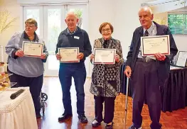  ?? ?? Ten-year award recipients: Karen Algie, Ray Derbyshire, Jenny Drummond and Dave Drummond.