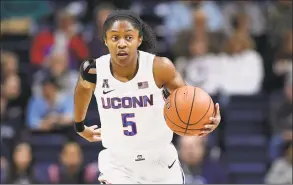  ?? Jessica Hill / Associated Press ?? UConn’s Crystal Dangerfiel­d dribbles during an exhibition game earlier this month.