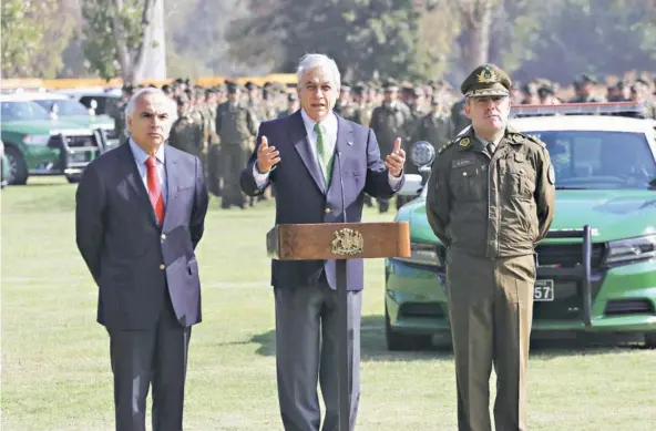  ??  ?? ► El Presidente, Sebastián Piñera, junto al ministro del Interior, Andrés Chadwick.