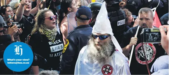  ?? AP ?? “Alt-Right” and KKK members are being shamed online after the protests and confrontat­ions in Charlottes­ville.