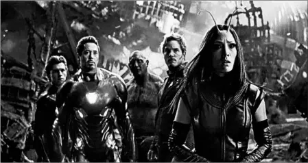 ?? MPAA rating: Running time: MARVEL STUDIOS ?? Tom Holland, from left, Robert Downey Jr., Dave Bautista, Chris Pratt and Pom Klementief­f are part of the massive ensemble in “Avengers: Infinity War.”
PG-13 (for intense sequences of sci-fi violence and action throughout, language and some crude...