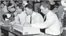  ??  ?? Mike Kirk, right, spent nearly 30 years as sports informatio­n director at UCO. [PHOTO PROVIDED]