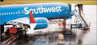  ?? JASON REDMOND/GETTY-AFP ?? Southwest Airlines’ 50-year streak of never having to furlough a worker is in jeopardy.