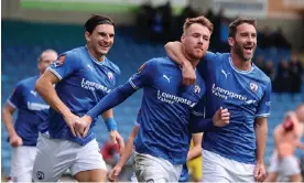  ?? ?? Tom Naylor (centre) got the only goal as Chesterfie­ld manager Paul Cook enjoyed victory over his former side. Photograph: Jan Kruger/Getty Images