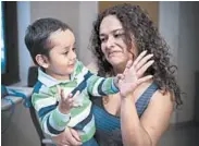  ?? PETER BARTA/ST. JUDE CHILDREN'S RESEARCH HOSPITAL ?? Giannina Alva holds her son, Gael Jesus Pino Alva, one of eight children with "bubble boy disease" who have had it fixed. “This therapy has cured the patients,” a doctor says.