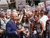  ?? Melissa Phillip / Staff photograph­er ?? Steven Hotze, a Republican activist, speaks during a rally he organized in Harris County.