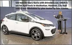  ??  ?? GM honcho Mary Barra with driverless car, which is set for April tests in Manhattan. However, City Hall said it was blindsided by plan touted by Gov. Cuomo.