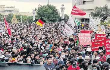  ?? WICHAN CHAROENKIA­TPAKUL ?? A pro-democracy gathering at Democracy Monument yesterday. Business leaders worry prolonged conflicts may cripple the economy further, especially if there is violence.