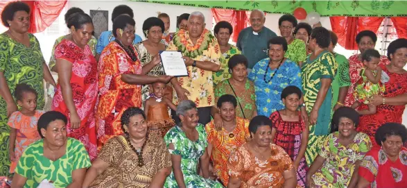 ?? Photo: Waisea Nasokia ?? Prime Minister Voreqe Bainimaram­a hands over the Cerificate to the Biausevu Women Associatio­n president at the Women’s Resource Centre opening in Korolevu, Nadroga on february 6, 2020.
