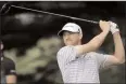  ?? AP PHOTO/TONY DEJAK ?? Jimmy Walker tees off on the second hole during the second round of the Bridgeston­e Invitation­al golf tournament at Firestone Country Club, Friday in Akron, Ohio.