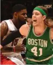  ?? RON TURENNE/NBAE/GETTY IMAGES ?? Amir Johnson and the Raptors won despite 23 points by the Celtics’ Kelly Olynyk, right.