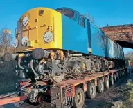  ?? Richard Thompson ?? Having left its home for the last 33 years at Tyseley Locomotive Works, 40118 arrives at Shackersto­ne on January 5. Restoratio­n will now continue at its new home under the auspices of the 16SVT Society.