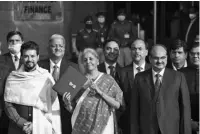  ?? PHOTO: PTI ?? Finance Minister Nirmala Sitharaman holds a folder case containing a tablet with files of the Union Budget 2021-22 on it