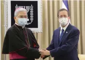  ?? (Amos Ben Gershom/GPO) ?? PRESIDENT ISAAC HERZOG with Papal Nuncio Archbishop Adolfo Tito Yilana.