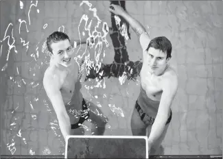  ?? @IMartensHe­rald Herald photo by Ian Martens ?? LASC swimmers Chris Alexander and Raine Arden have committed to swim with the University of Lethbridge Pronghorns team next season.