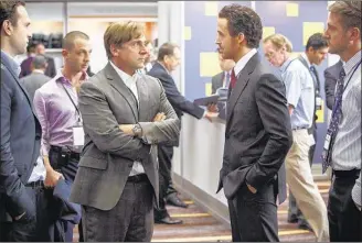  ?? PHOTOS COURTESY PARAMOUNT PICTURES ?? Left to right: Rafe Spall as Danny Moses, Jeremy Strong as Vinnie Daniel, Steve Carell as Mark Baum, Ryan Gosling as Jared Vennett and Jeffry Griffin as Chris in “The Big Short.” The reallife characters made millions of dollars off the bursting of the...