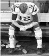  ?? CHRISTIAN PETERSEN/GETTY IMAGES ?? Brady sits on the bench Sunday.