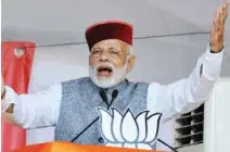  ?? PTI ?? GARNERING SUPPORT: Prime Minister Narendra Modi waves at crowd during BJP Parivartan Rally at Rait near Dharamsala on Saturday. -