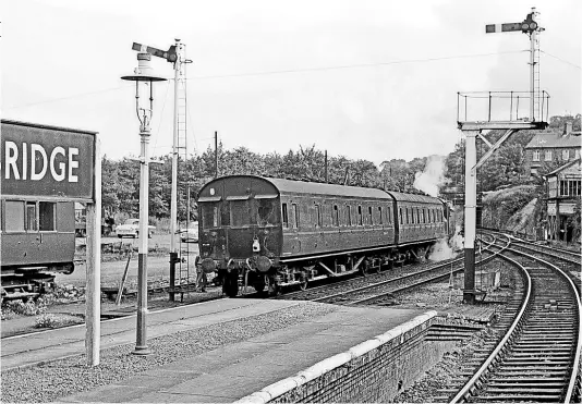  ??  ?? In 1964, a number of trains from Amlwch ran through to Bangor and back. One of them, the 10.38am from Amlwch, leaves Menai Bridge station, returning to Bangor behind BR ‘2MT’ 2-6-2T No. 84003 on August 27, 1964. JOHN PRICE