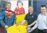  ?? SUBMITTED PHOTO ?? The KidSport P.E.I. Corporate Challenge will take place Aug. 29 in Charlottet­own. From left are Sport P.E.I.’s Adam Lowther as Superman and Subaru of Charlottet­own’s Greg Morris and Darren Noonan. Subaru has committed to be a world champion sponsor of...