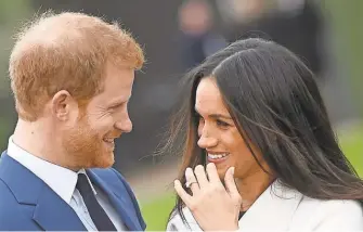  ?? FACUNDO ARRIZABALA­GA/ EPA- EFE ?? Britain’s Prince Harry and his fiancée, Meghan Markle, an American, were introduced by a friend.