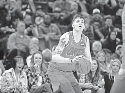  ?? BRYAN TERRY/THE OKLAHOMAN ?? Thunder guard Vit Krejci (27) makes a 3-pointer during a 124-104 loss to the Suns on Feb. 24 at Paycom Center.