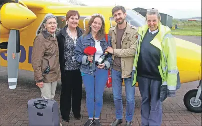  ??  ?? Nicola Gurney and Mathieu Willcocks, with passenger Jean Peddie, left, and Dixie Porter of Hebridean Air Services, along with pilot Julie Angell.