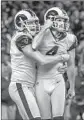  ?? Robert Gauthier L.A. Times ?? HOLDER Johnny Hekker hugs Greg Zuerlein after the kicker’s boot won the NFC title.