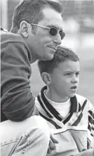  ?? COURTESY: LOVULLO FAMILY ?? Diamondbac­ks manager Torey Lovullo pictured with his son, Nick, in Thousand Oaks, Calif. circa 2002.