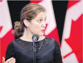  ?? GEOFF ROBINS, THE CANADIAN PRESS ?? Minister of Internatio­nal Trade Francois-Philippe Champagne, left, and Foreign Affairs Minister Chrystia Freeland at a cabinet retreat in London, Ont.