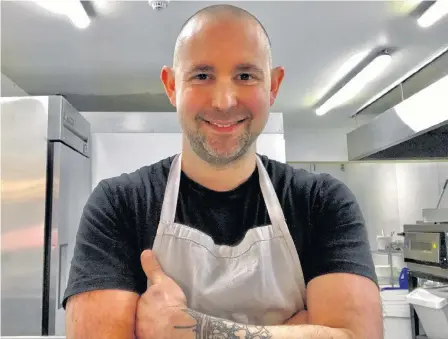  ?? DANIEL DUCKETT/HANDOUT VIA REUTERS ?? Daniel Duckett, one of thousands of store owners whose livelihood has been hurt by a government mandated shutdown to help curb the spread of the novel coronaviru­s, poses at his Lazy Claire Patisserie in Belfast, Northern Ireland April 13, 2020.