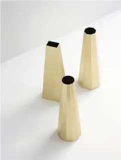  ??  ?? Above — Simple, faceted brass vases are typical of Son’s work; he wants his objects to enhance daily rituals and last a lifetime or longer.