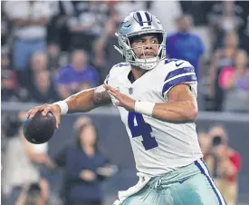  ??  ?? Cowboys quarterbac­k Dak Prescott during the game against the Texans.