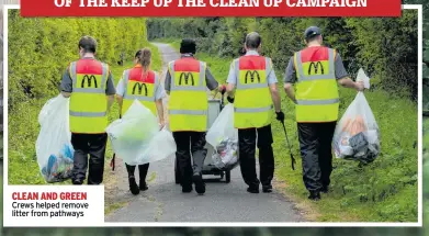  ??  ?? CLEAN AND GREEN Crews helped remove litter from pathways