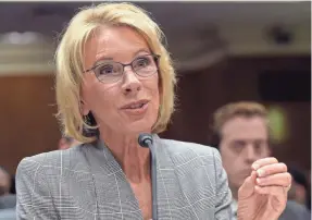  ?? SUSAN WALSH/AP ?? U.S. Secretary of Education Betsy DeVos on her decision to cut federal funding to the Special Olympics: “Given our current budget realities, the federal government cannot fund every worthy program,” she said.