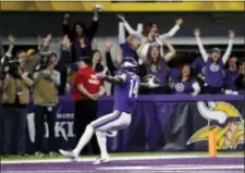  ?? JEFF ROBERSON — THE ASSOCIATED PRESS ?? Vikings wide receiver Stefon Diggs (14) celebrates his last-second, game-winning touchdown that gave the Minnesota Vikings a 29-24 come-from-behind victory over the New Orleans Saints Sunday in the divisional round of the NFC playoffs in Minneapoli­s.