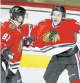  ?? AP ?? Blackhawks centre Andrew Shaw, right.